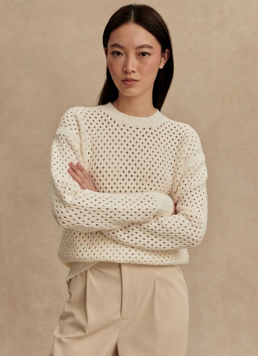 Varley Grady Boucle Knit Sweater in Coconut Milk Front View Model With Her Arms Crossed