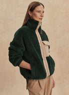 Varley Lowell Sherpa Jacket in Pine Grove Side View With Hand in Pocket