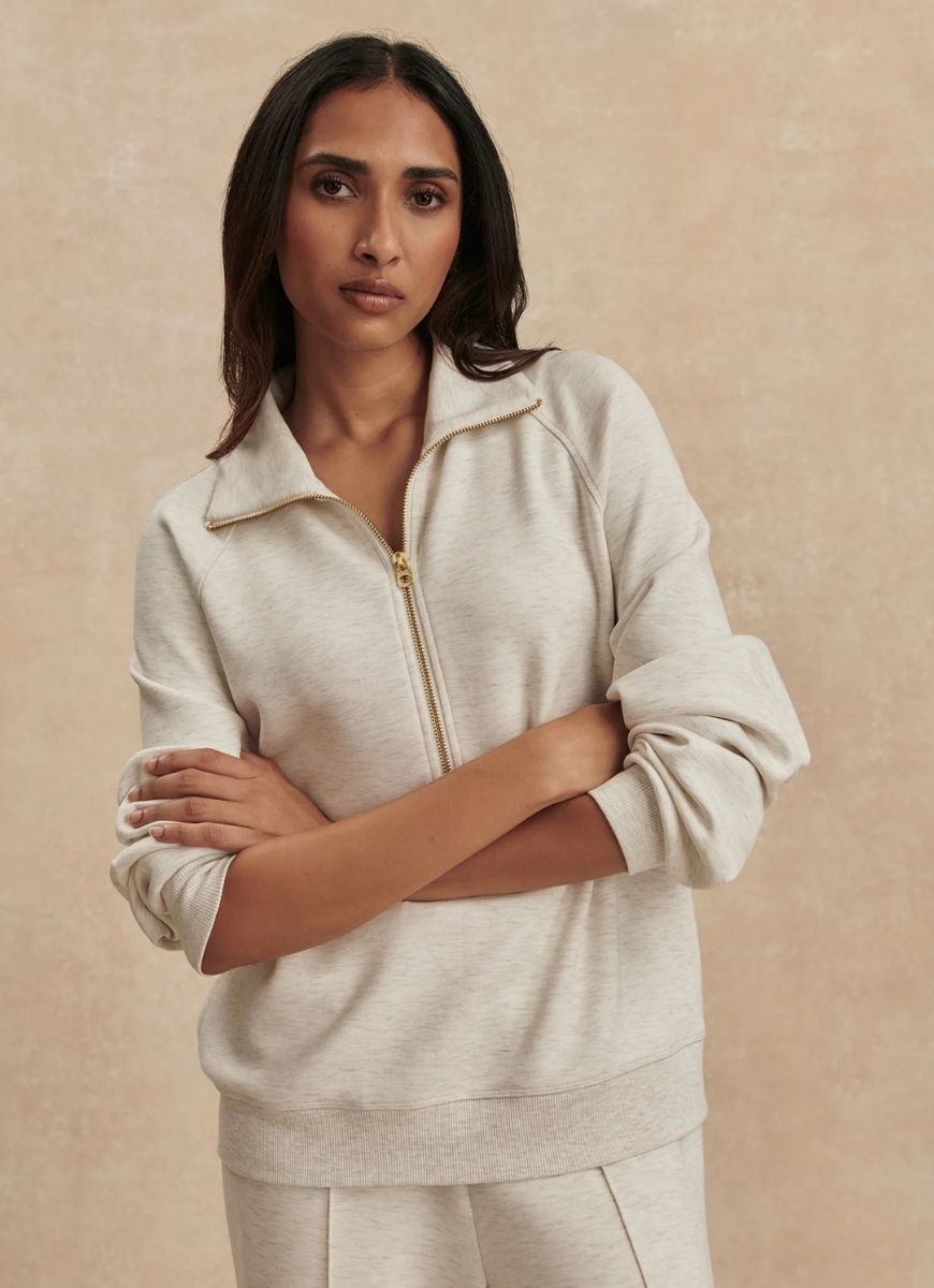 Varley Selene Half Zip Sweatshirt in Ivory Marl Front View Showing Model With Arms Crossed