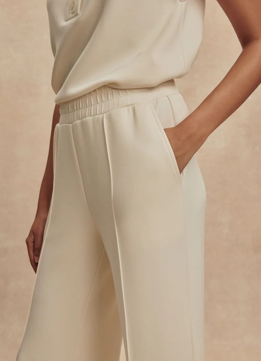Varley The Wide Leg Pant 30” in Pristine Close Up Side View With Hand in Pocket