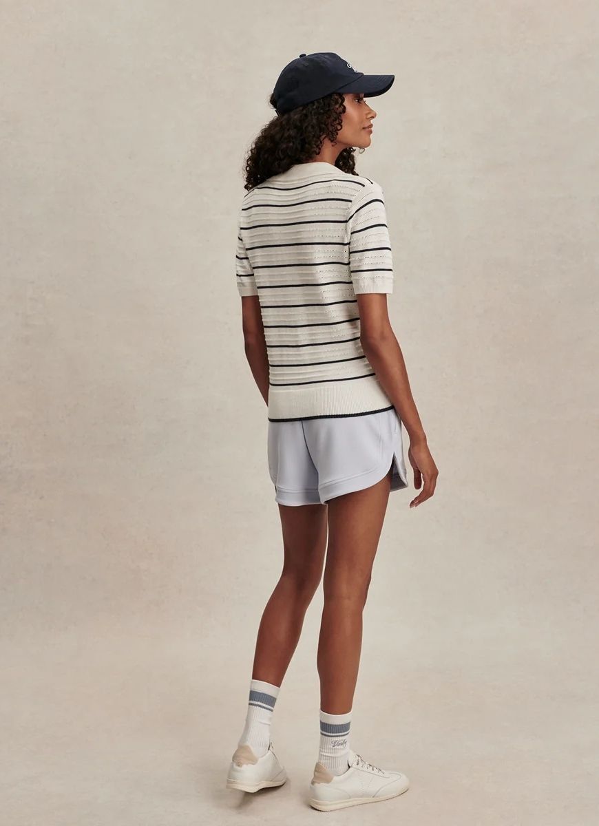 Varley Wren Knit Polo in White/Blue Nights Full Length Back View