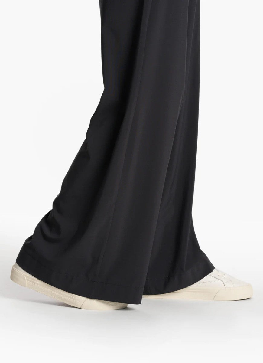 Vuori Women's Villa Wide Leg Pant in Black Side View of Bottom Cuff