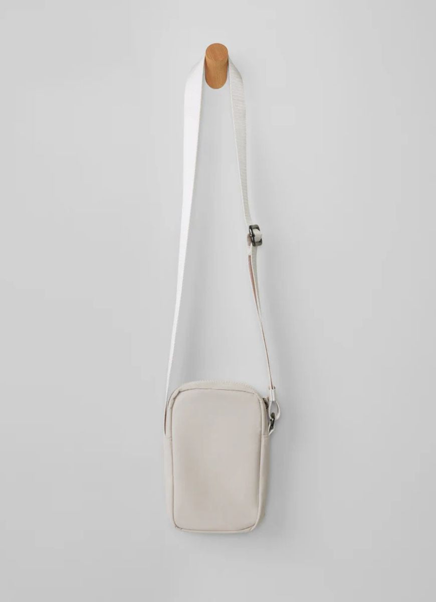 Vuori All Around Crossbody Bag in Ecru Shown Hanging