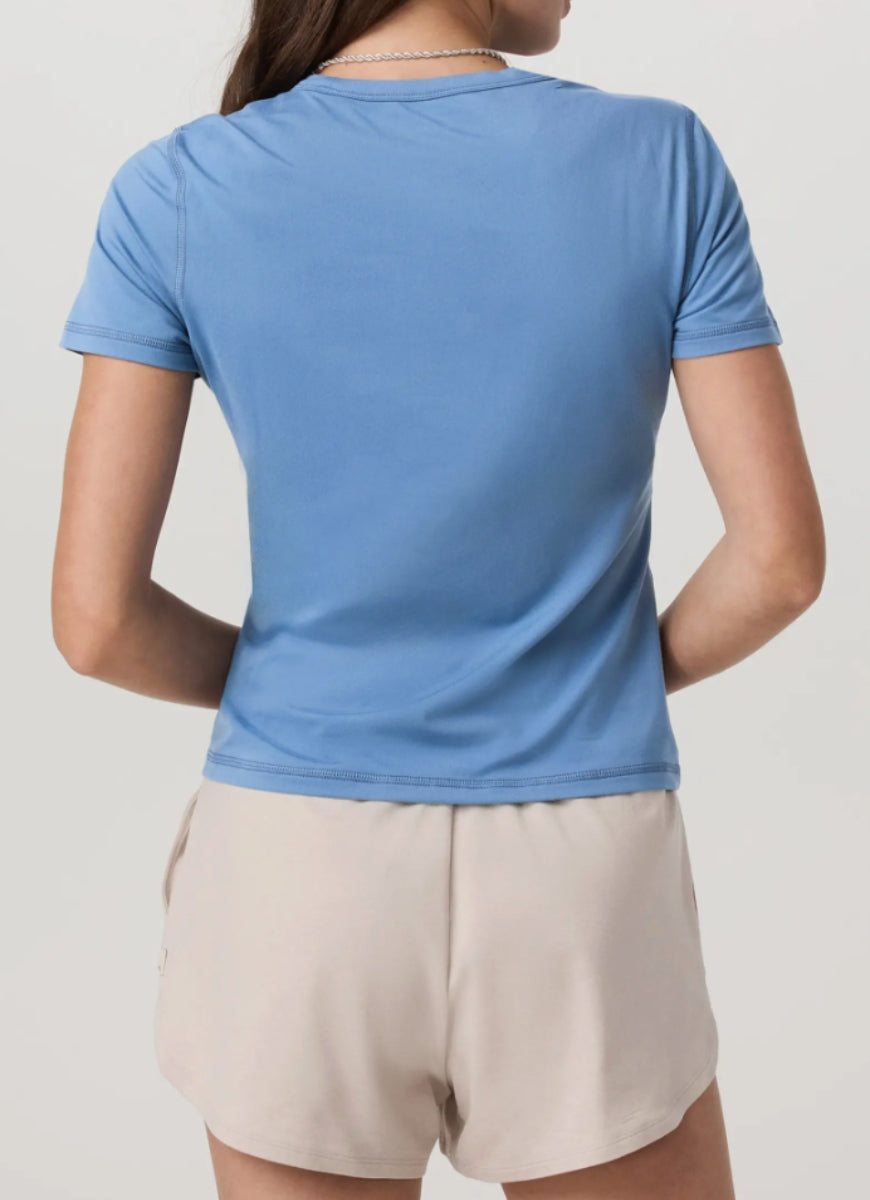 Vuori Women's Lux Tee in Light French Blue Back View