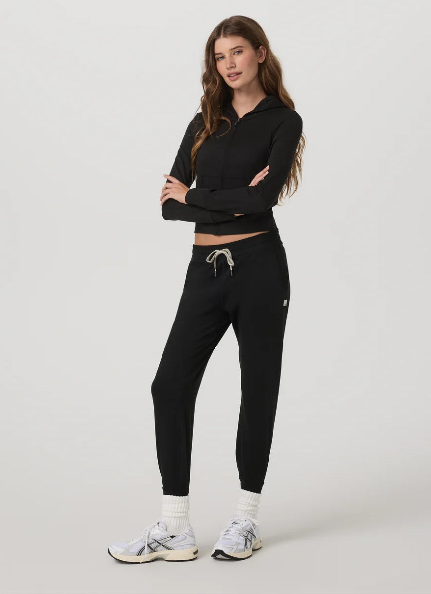 Vuori Women's Performance Jogger Long in Black Heather Full Length Angled Front and Side View