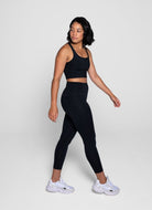 Girlfriend Collective High Rise Compressive Legging in Black Side View