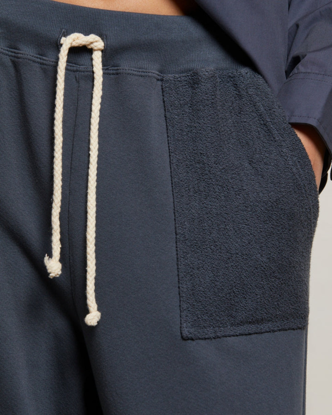 PerfectWhite Tee Collection Showing a Close Up Front View of the Rosanna Reverse Pocket Pant in Night