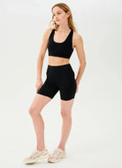 Splits59 Airweight High Waist 6” Bike Short in Black Full Length Angled Side View