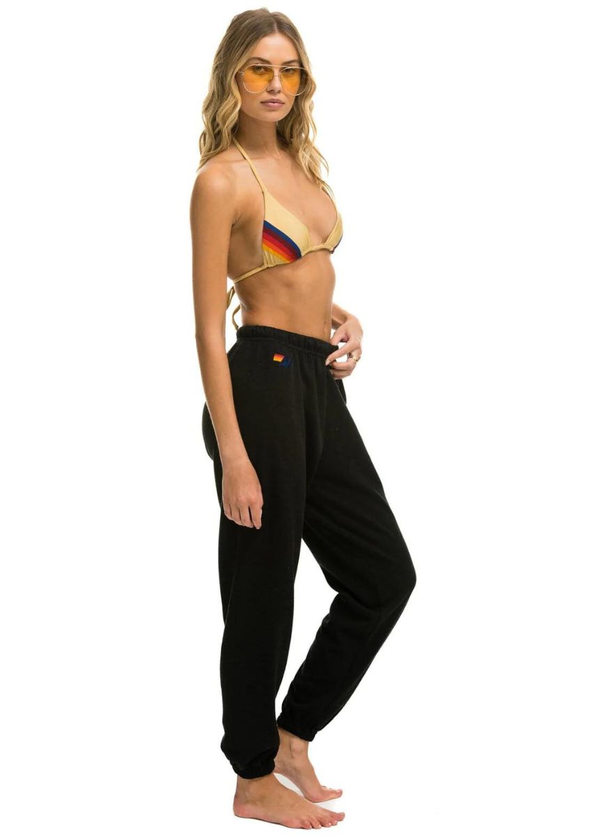 Aviator Nation 5 Stripe Women’s Sweatpants in Black with Neon Rainbow Stripes Full Side View