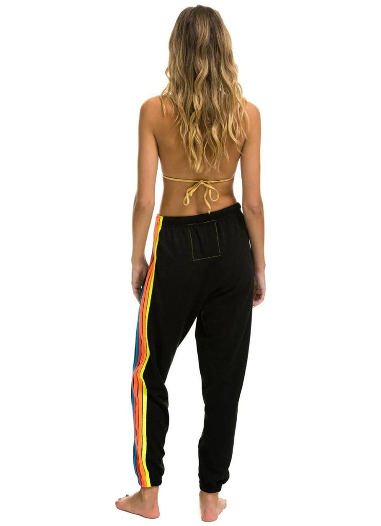Aviator Nation 5 Stripe Women’s Sweatpants in Black with Neon Rainbow Stripes Full Back View