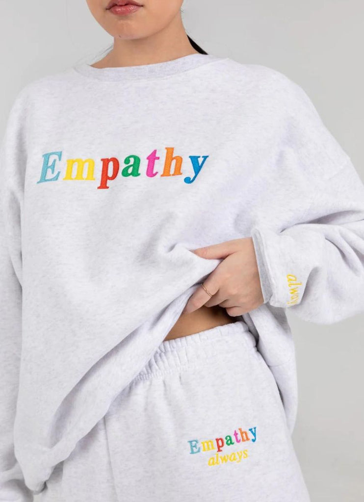 The Mayfair Group Empathy Always Sweatpants in Grey Close Up View of Waistband and Logo