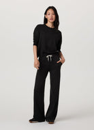 Vuori Women's Long Sleeve Halo Crew in Heather Black Full Length Front View
