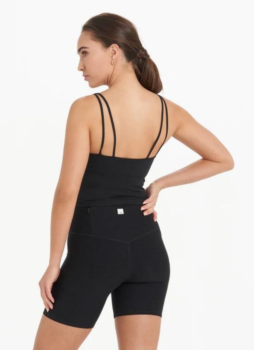vuori Women's Halo Performance Crop in Black Heather Back View with Hand on Hip