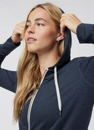 Vuori Women's Halo Performance Hoodie 2.0 in Midnight Heather Close Up View With Hood Up