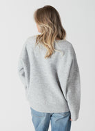 Lyla + Luxe Heart Sweater in Light Grey/Pink Back View