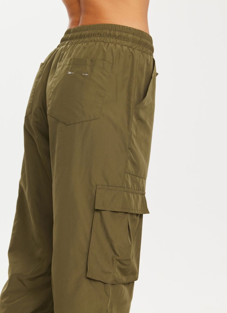 The Upside Kendall Cargo Pant in Olive Close Up Side View