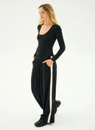 Splits59 Luca Airweight Trouser With Stripe in Black Full Length Side View