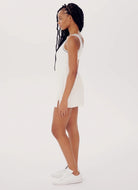 Splits59 Martina Rigor Tennis Dress With Piping in White Full Length Side View