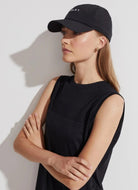 Varley Niles Active Cap in Black Shown on Model Side View