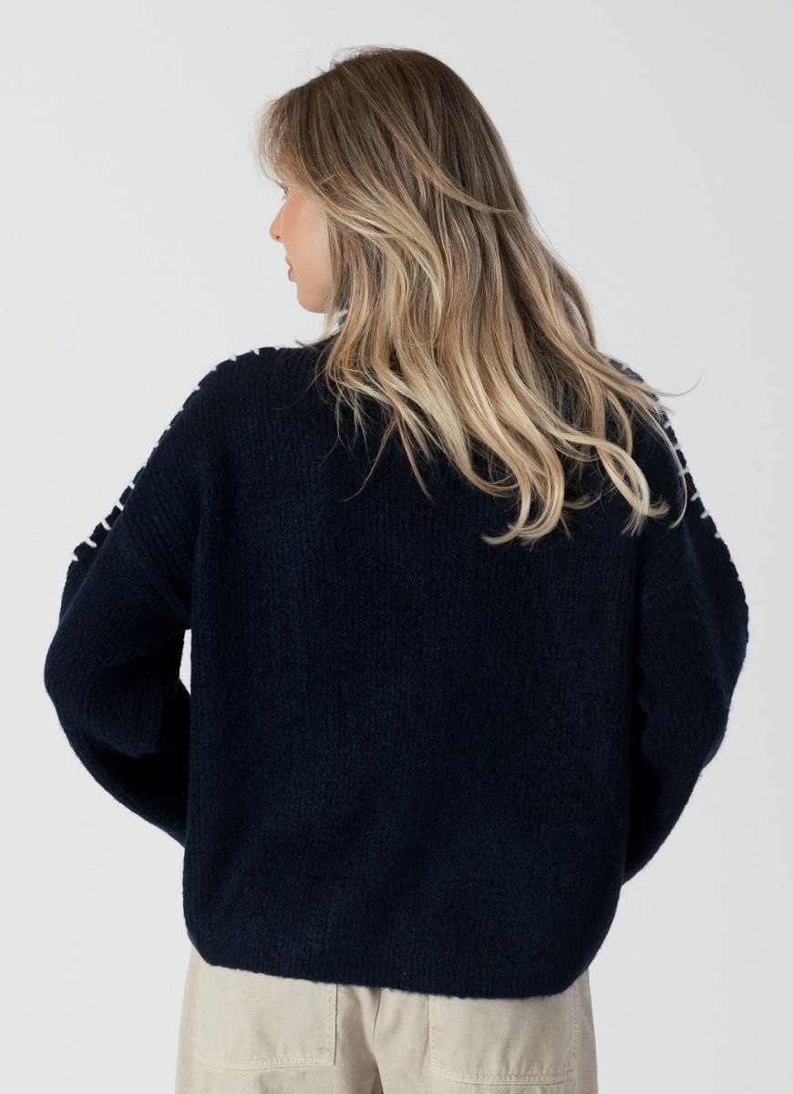 Lyla + Luxe Nyla Mockneck Sweater in Navy/White Back View