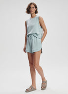 Varley Ollie High Rise Short 3.5" in Ether Blue Full Length Front View With Hand in Pocket