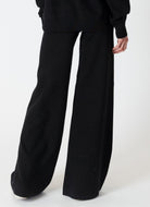 Lyla + Luxe Pico Wide Leg Pant in Black Back View