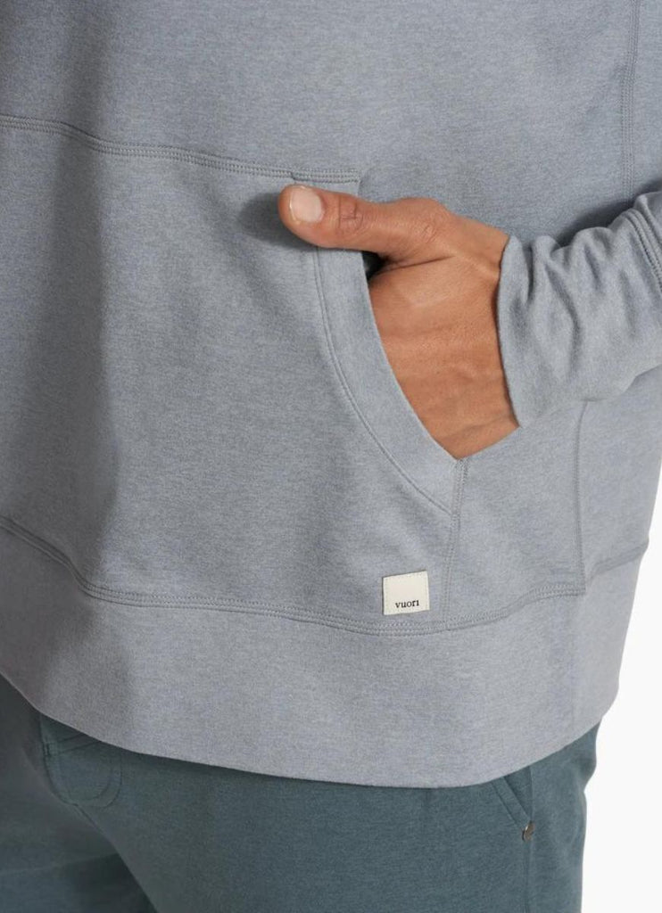 Vuori Mens' Ponto Performance Half Zip Hoodie in Steel Heather Close Up View of Hand in Pocket