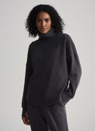 Varley Rainer Roll Neck Jumper in Black Marl