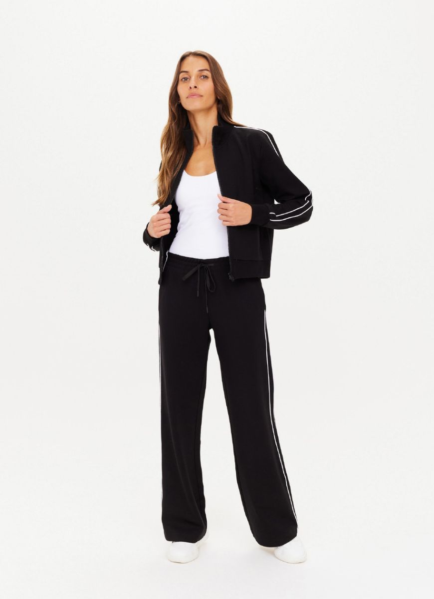 The Upside Realm Jetset Pant in Black Front View with Matching Jacket