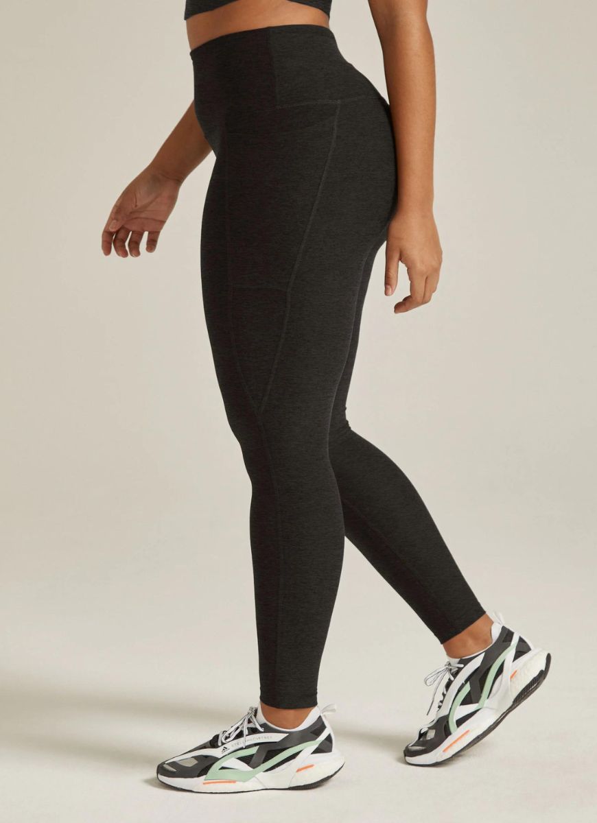 Beyond Yoga Out of Pocket High Waisted Midi Legging in Darkest Night Side View