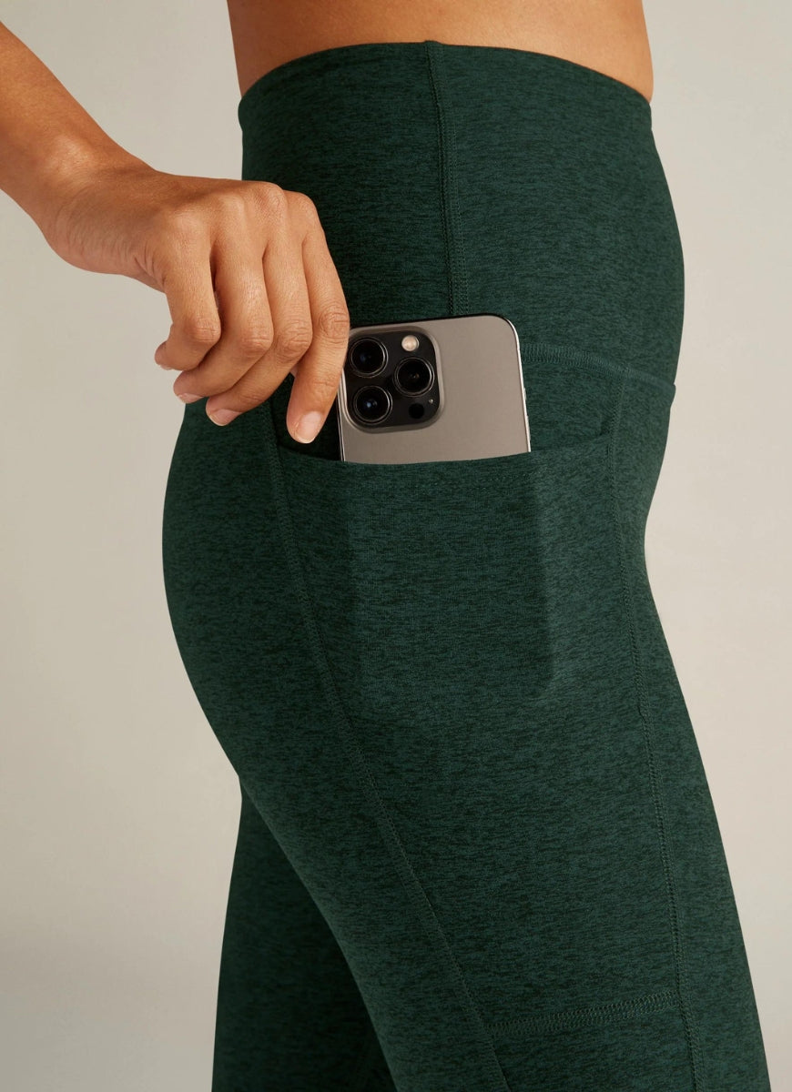 Beyond Yoga Spacedye Out Of Pocket High-Waist Legging in Dark Green Close Up View With Mobile Phone in Side Pocket