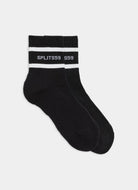 Black socks with white stripes and 'SPLITS59' branding on a light gray background