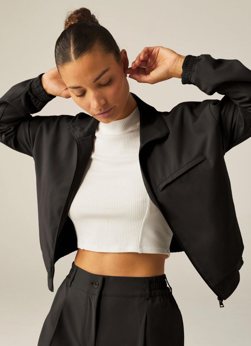 Beyond Yoga Status Pocket Sleeve Cropped Jacket in Black Front View Unzipped