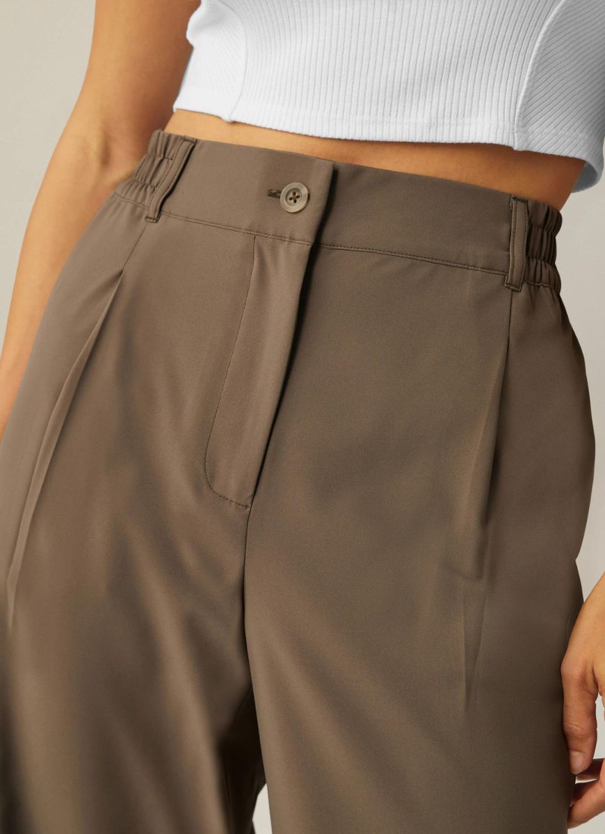 Beyond Yoga Status Wide Leg Trousers in Dune Close Up Front View