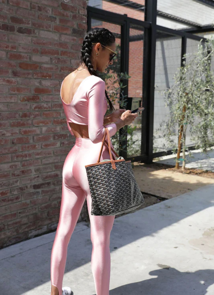 HÉROS The Ballerina Cropped Top in Blush Back VIew with Model Holding a Hand Bag