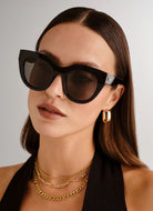 Le Specs Air Heart Women's Polarized Sunglasses in Black Shown on Model