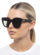 Le Specs Air Heart Women's Polarized Sunglasses in Black Shown on Model Side View