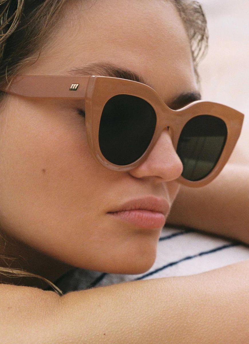 Le Specs Air Heart Polarized Sunglasses in Caramel Close Up Shown on Model