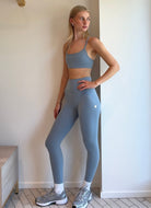 Vuori AllTheFeels Sports Bra in Seaglass Full Length Angled Side View