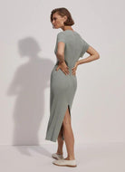 Varley Aria Knit Midi Dress in Green Milieu Full Back View Model With Hands on Hips