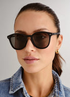 Le Specs Women's Bandwagon Sunglasses in Black Front View Shown on Face