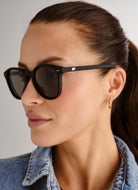 Le Specs Women's Bandwagon Sunglasses in Black Side View Shown on Face