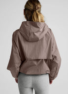 Beyond Yoga Limitless Hooded Jacket in Rosey Taupe Back View