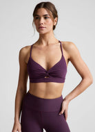 Beyond Yoga Twist Front Strappy Sports Bra in Brilliant Blackberry
