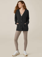 Beyond Yoga Women's Carefree Cardigan in Black Full Front View with Hands in Pockets