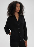 Varley Celeste Button Through Sweat in Black Front View With Hand in Pocket