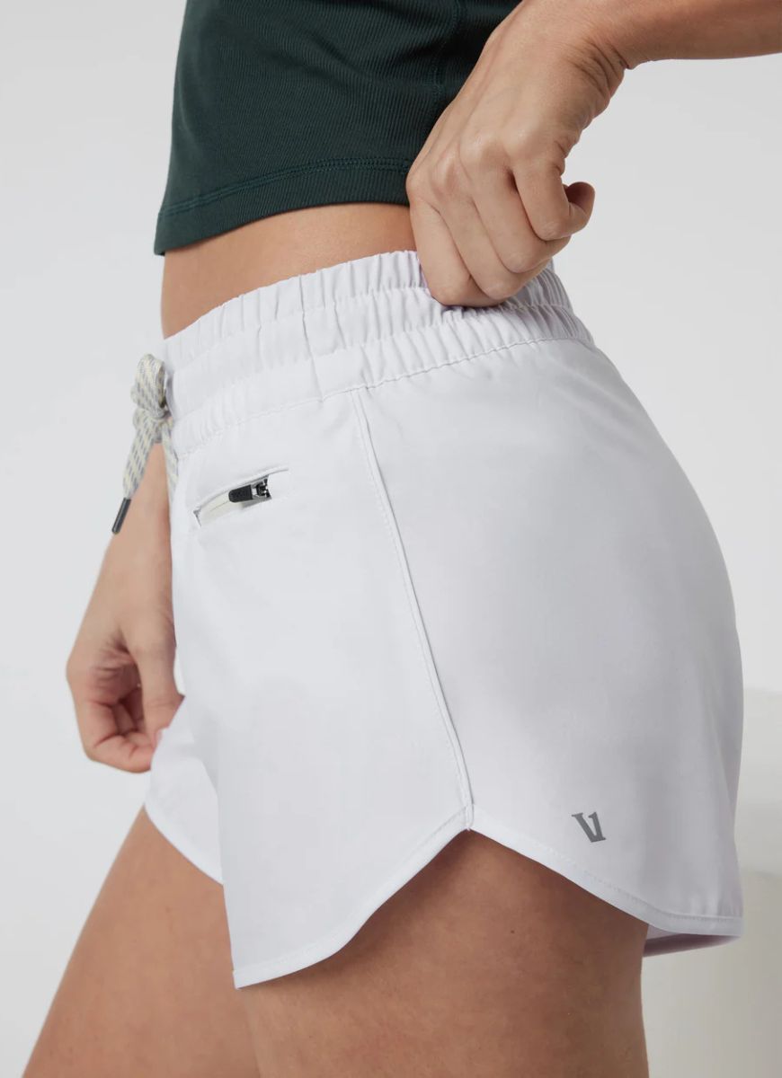 Vuori Women's Clementine 4” Short 2.0 in White Close Up Side View