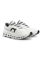 On Women's Cloudmonster in All White Two Shoe Angled Side View