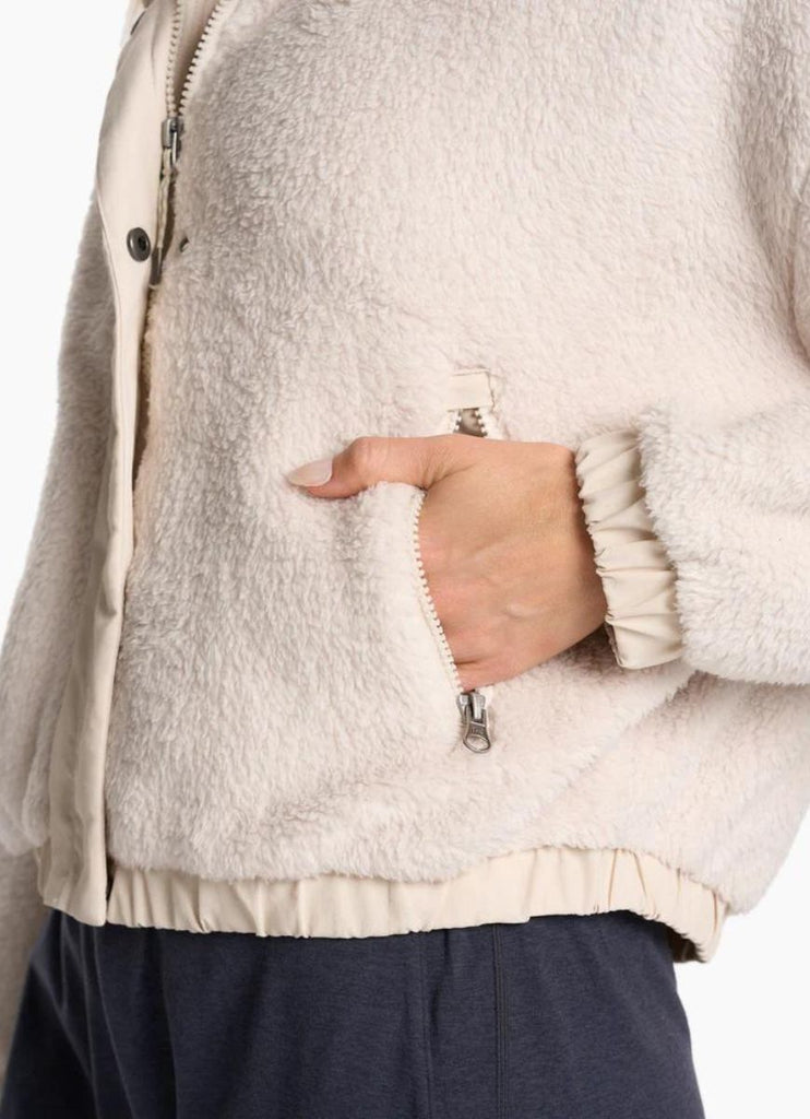 Vuori Women's Cozy Sherpa Jacket in Dune Close Up View of Hand in Pocket