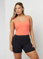 Vuori Daily Crop Tank Top in Pomelo Front View